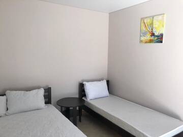 Фото номера Стандартный трехместный номер Отель Villaninna г. Курортное 4