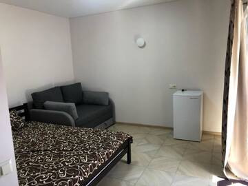 Фото номера Стандартный четырехместный номер Отель Villaninna г. Курортное 8